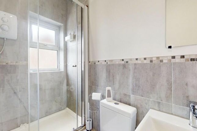 Bright And Modern Bathroom Suite Featuring A Spaci...
