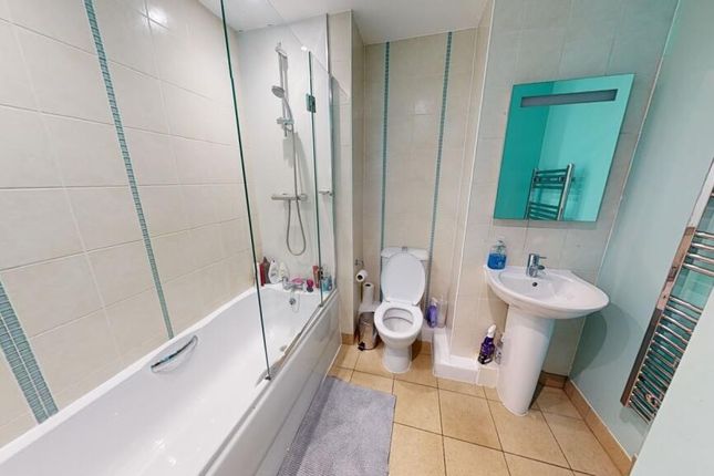 A Bright, Clean, And Modern Bathroom Suite Featuri...