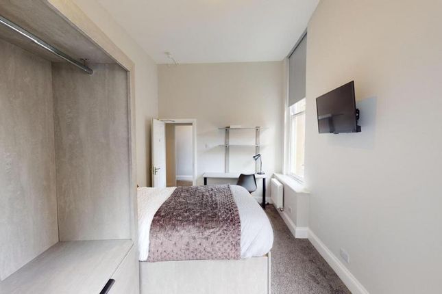 A Bright And Inviting Double Bedroom With Modern d...