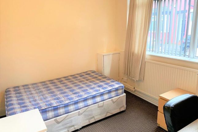 Bright And Inviting Double Bedroom Featuring A Com...