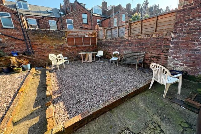 A Tidy And Spacious Outdoor Garden Area With Ample...