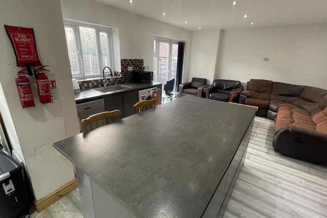 Open-Plan Living Area With A Large Central Island,...