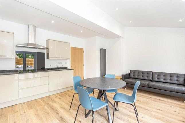 Bright And Modern Living Room Featuring A Sleek Op...