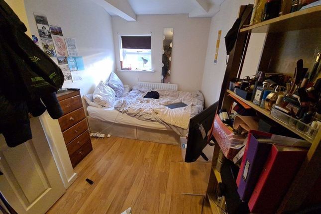 A Compact, Tidy Bathroom Featuring A Toilet And A ...