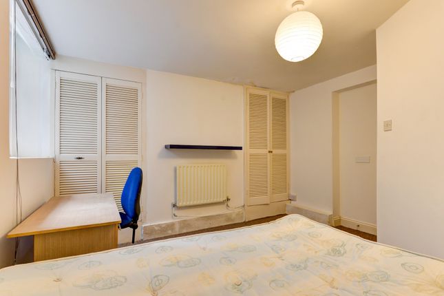 A Bright And Tidy Double Bedroom Featuring A Comfo...