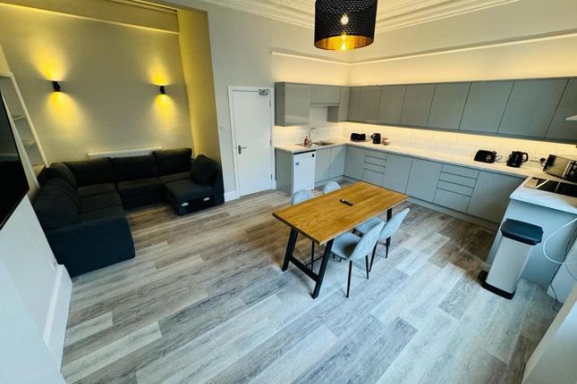 A Spacious And Bright Modern Living Room With Styl...