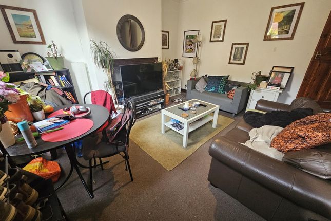 Cozy Living Room Featuring Comfortable Sofas, A Co...