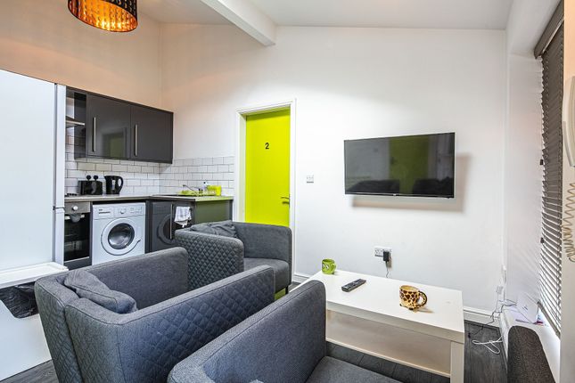 Bright, Modern Open-Plan Living Area With A Compac...