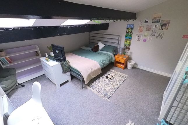 Bright, Neatly Kept Bedroom With A Comfortable Dou...