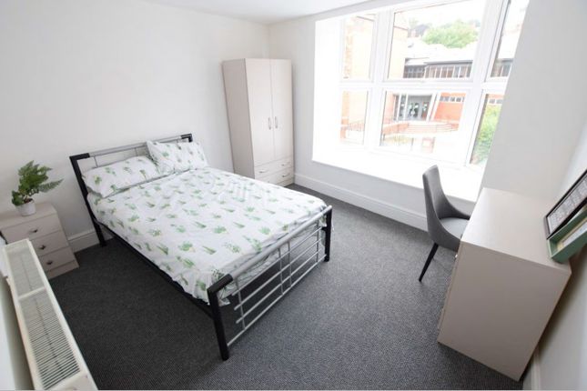 A Bright And Spacious Double Bedroom Featuring Mod...