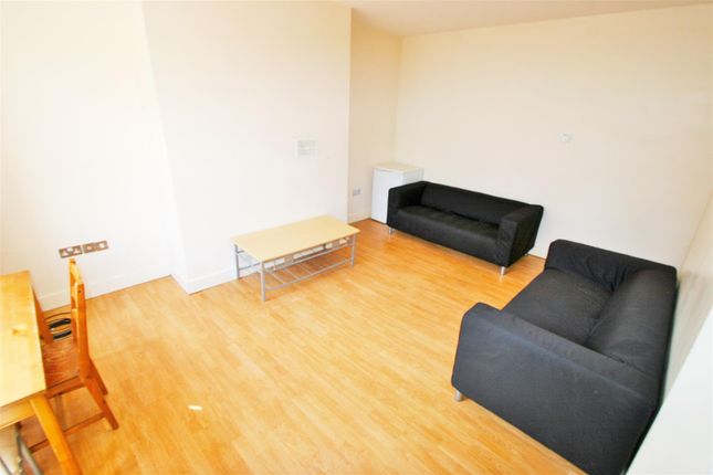 Bright And Welcoming Living Room With Ample Natura...