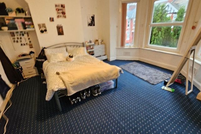 A Bright Double Bedroom Featuring A Large Bay Wind...