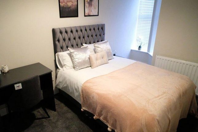 Cozy Double Bedroom Featuring A Comfortable Double...