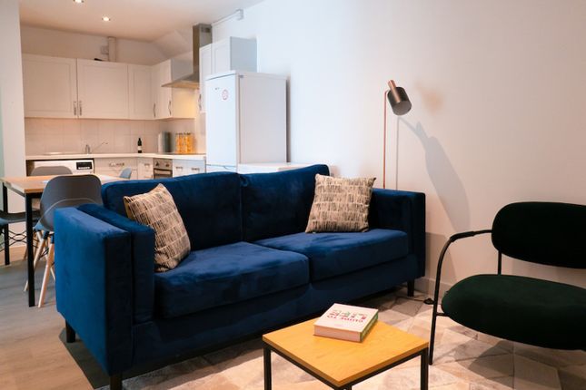 A Stylish And Spacious Modern Living Room Ideal Fo...