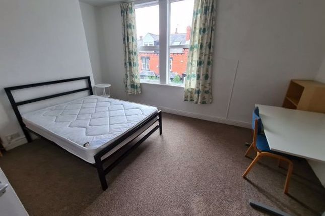 A Bright And Tidy Double Bedroom Featuring A Comfo...