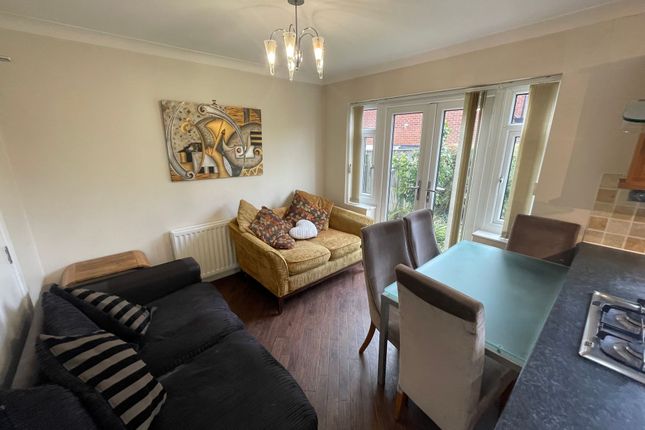 A Welcoming Living Room Filled With Natural Light ...