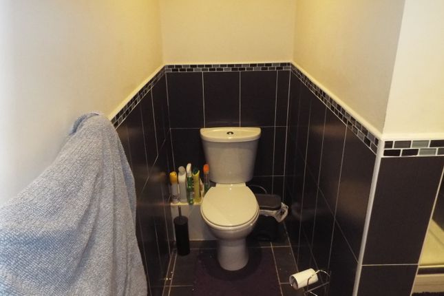 A Well-Maintained Single Toilet Area Featuring Mod...