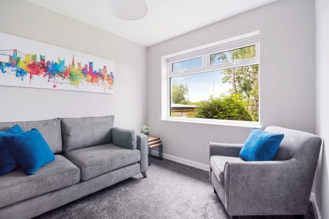 Bright, Freshly Decorated Living Room With A Large...