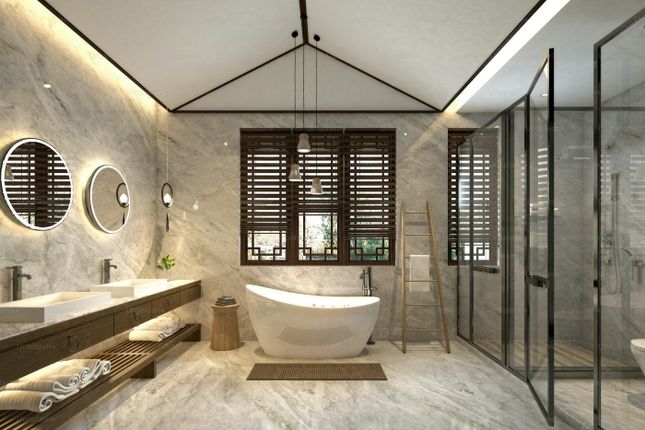 A Spacious And Modern Bathroom Featuring A Freesta...