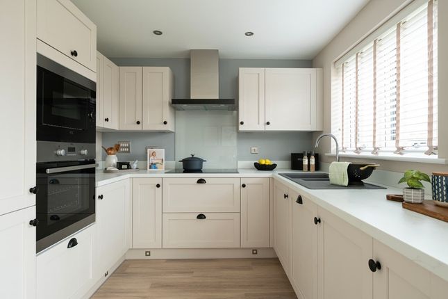 A Modern Kitchen With Ample Storage Space