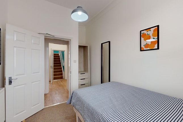 A Bright And Tidy Double Bedroom Featuring Modern ...