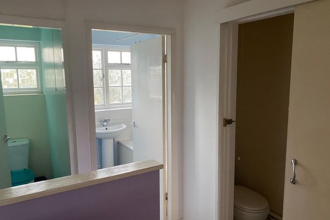 A Bright And Tidy Bathroom With Good Natural Light...