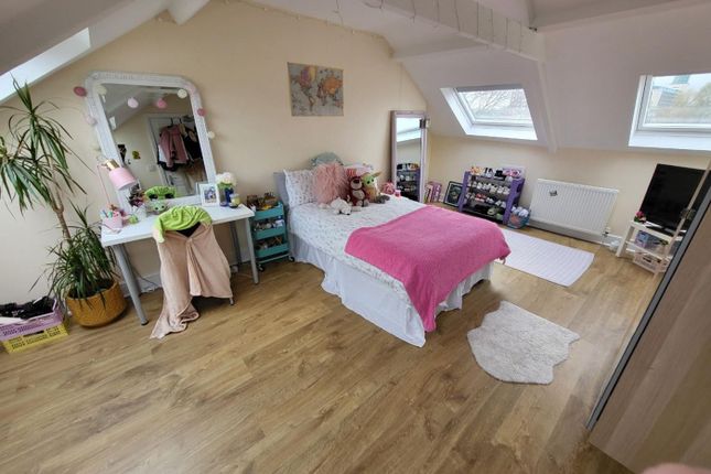 This Charming Double Bedroom Features Ample Natura...