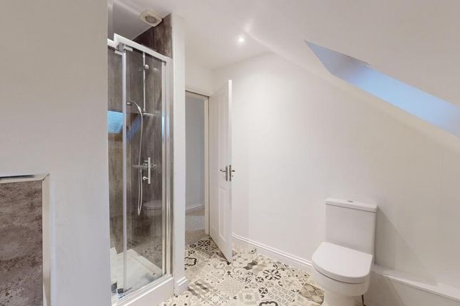 A Modern And Clean Bathroom Featuring A Spacious S...