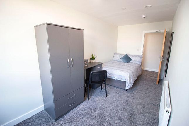 A Bright And Inviting Double Bedroom Featuring A c...