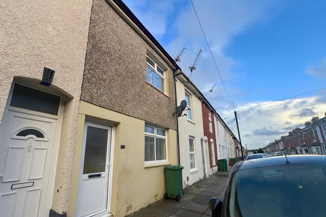 Row Of Terraced Houses On Quiet Street.Png