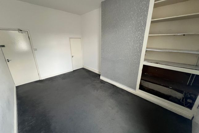 A Simple Double Bedroom With Neutral White Walls A...