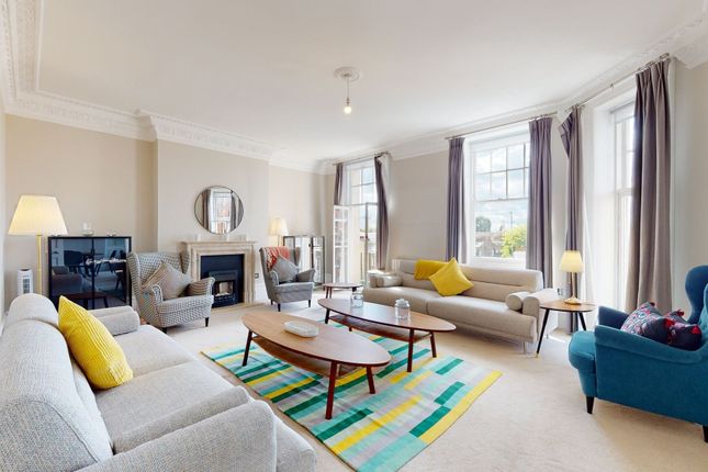 Bright And Spacious Living Room With Large Windows...