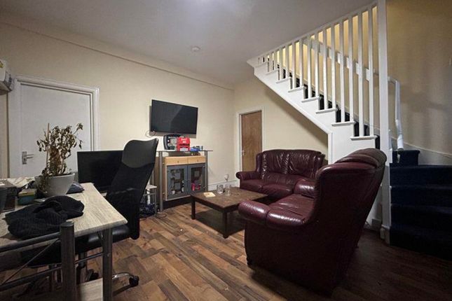 A Cozy Living Room With A Welcoming Atmosphere, Pe...