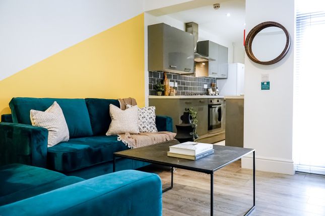 A Stylish And Inviting Large Modern Living Room Wi...