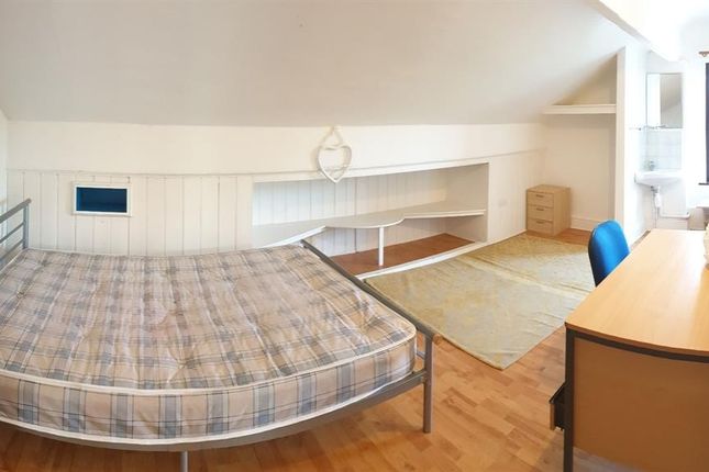 Bright And Tidy Single Bedroom Featuring A Comfort...