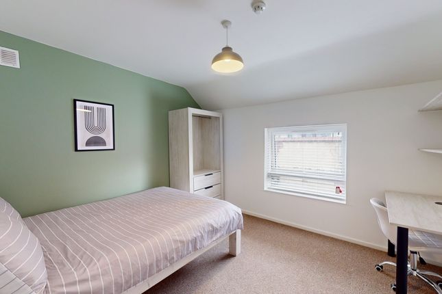 A Bright And Inviting Double Bedroom Featuring Mod...