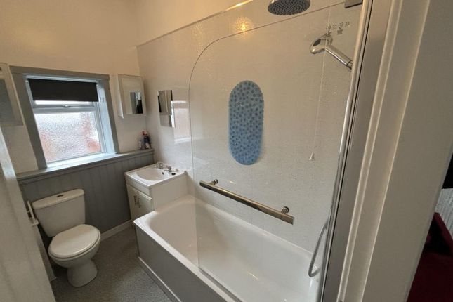 Bright And Clean Bathroom Suite Featuring A Bath W...