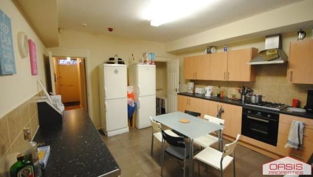 A Well-Maintained Kitchen With Ample Countertop Sp...