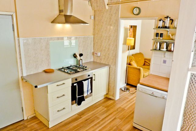 Bright And Functional Kitchen Featuring Modern App...
