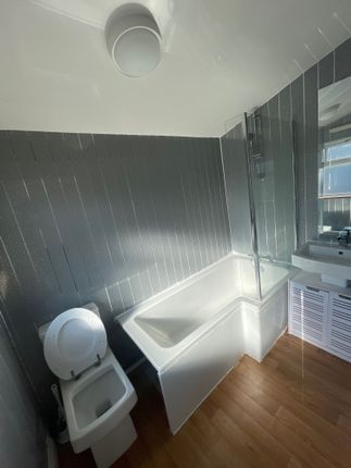 Bright And Modern Bathroom Suite Featuring A White...