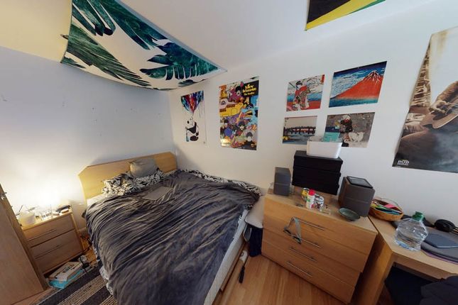 A Cozy Double Bedroom With A Comfortable Bed, A We...