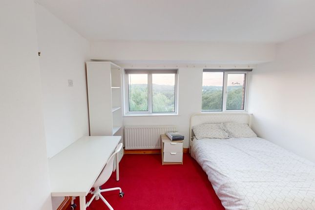 A Bright And Inviting Double Bedroom With Large Wi...
