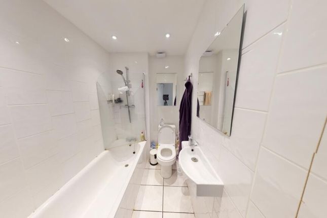 Bright And Modern Bathroom Suite Featuring A Full ...