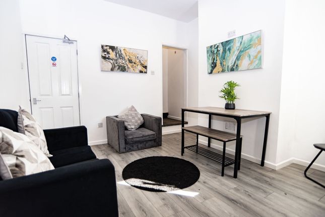 Bright And Contemporary Living Room Featuring Slee...