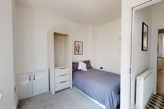 A Bright And Inviting Double Bedroom Featuring Mod...