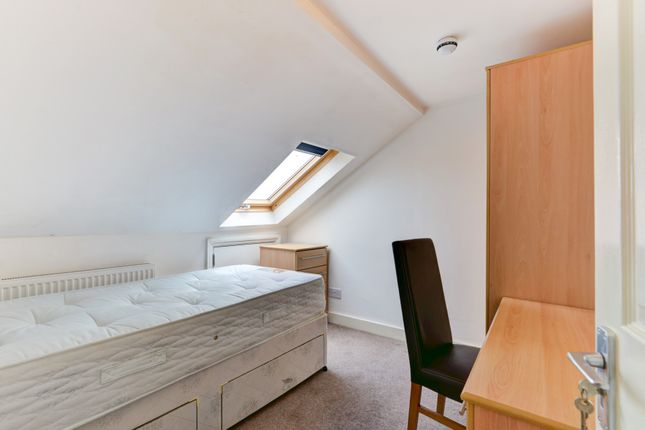 A Bright And Well-Maintained Bedroom Featuring A c...