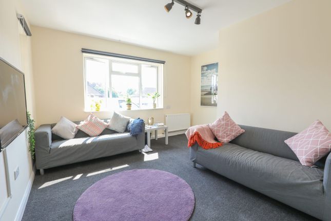 Bright And Welcoming Living Room With Ample Natura...