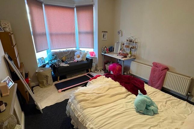 Bright And Cozy Master Bedroom Featuring A Large B...