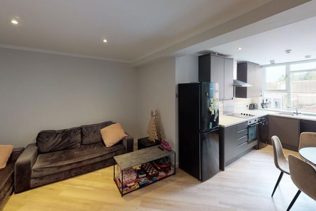 A Spacious And Well-Lit Modern Living Room Perfect...