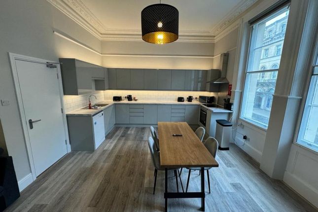 A Spacious And Modern Kitchen With Ample Natural l...